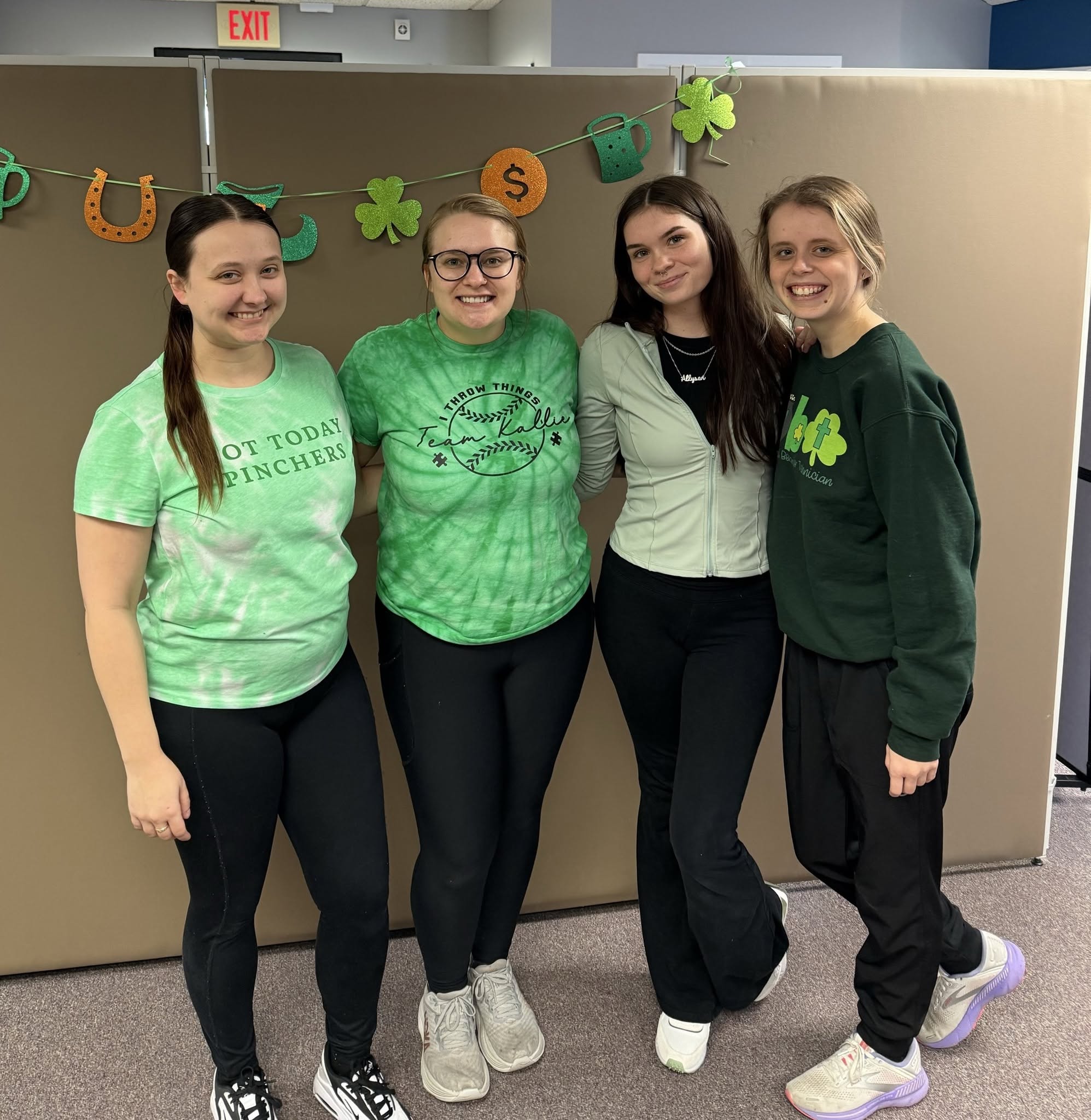 Axis Therapy Centers team members wearing green shirts